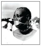 Black woman wearing torture instrument, Flanders tinplate gag