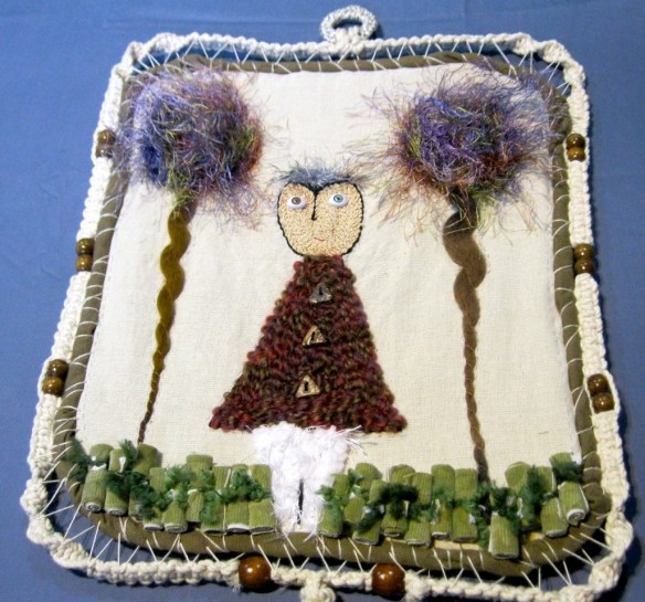 Marco hecho por Frank, and quilt hecha a mano por Patricia.